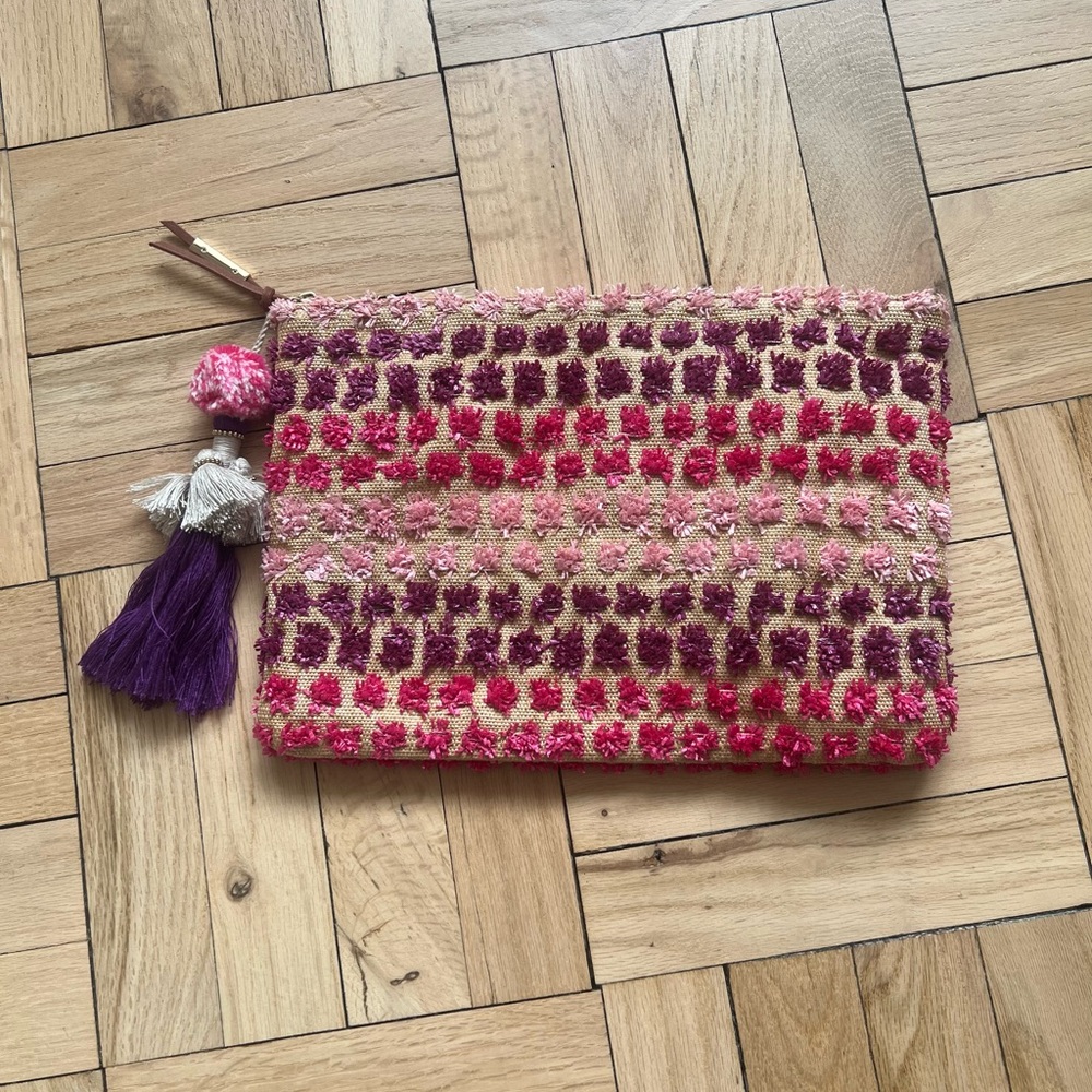 Steven textured, zippered clutch w/ tassel. Like new. 13”W, 9”H. Fun + festive!